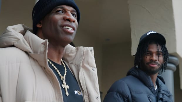 Deion Sanders with Shedeur Sanders at new house